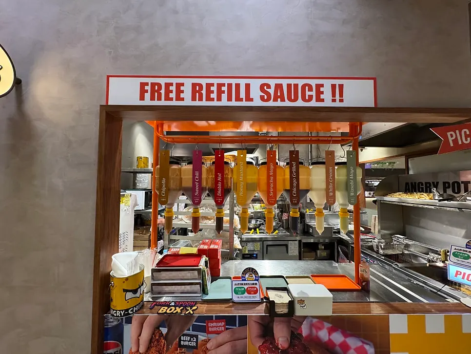 Various sauces served alongside the fries