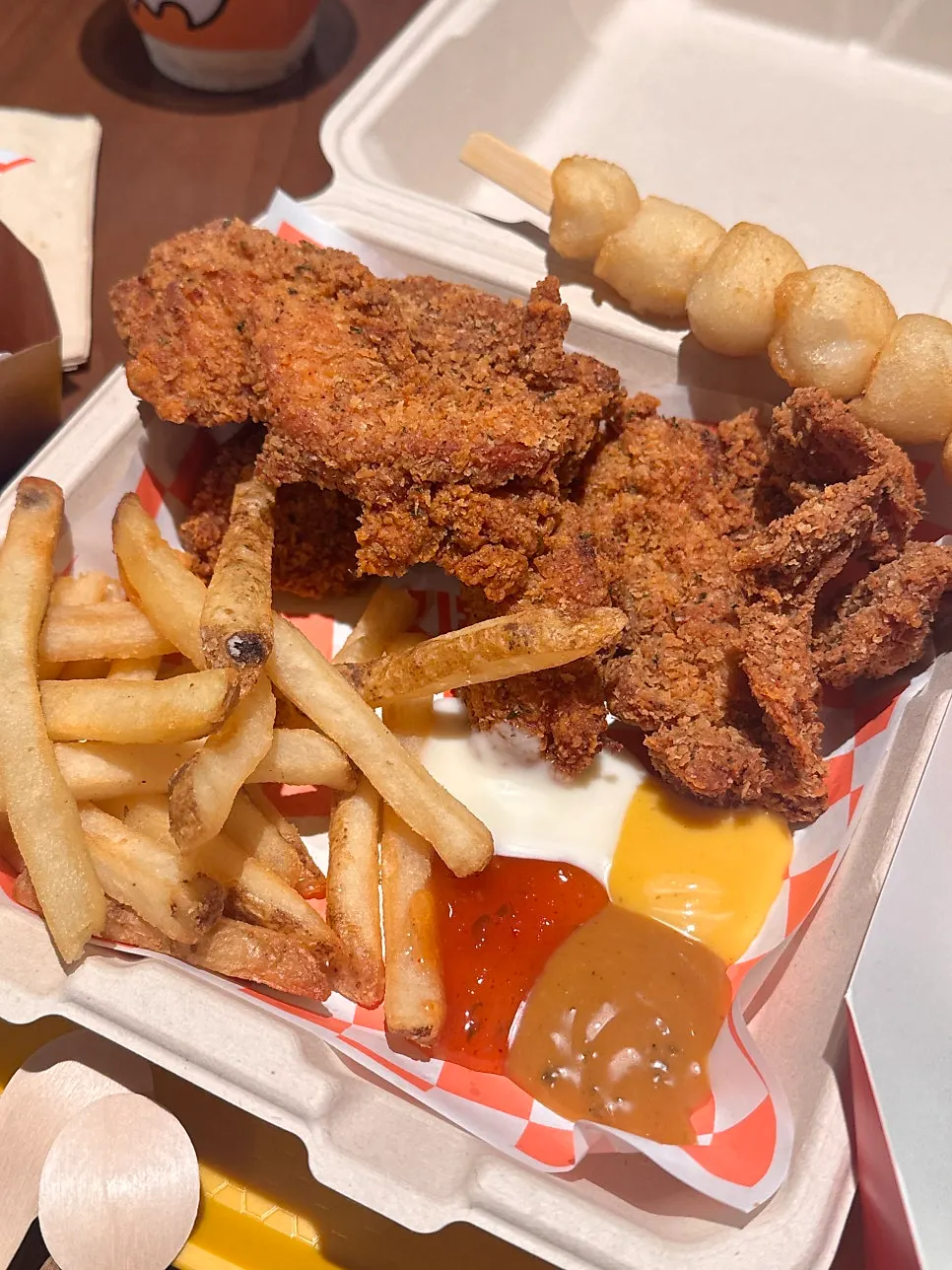 Fries and boneless drumstick chicken from the Deep Crunch Chicken Box