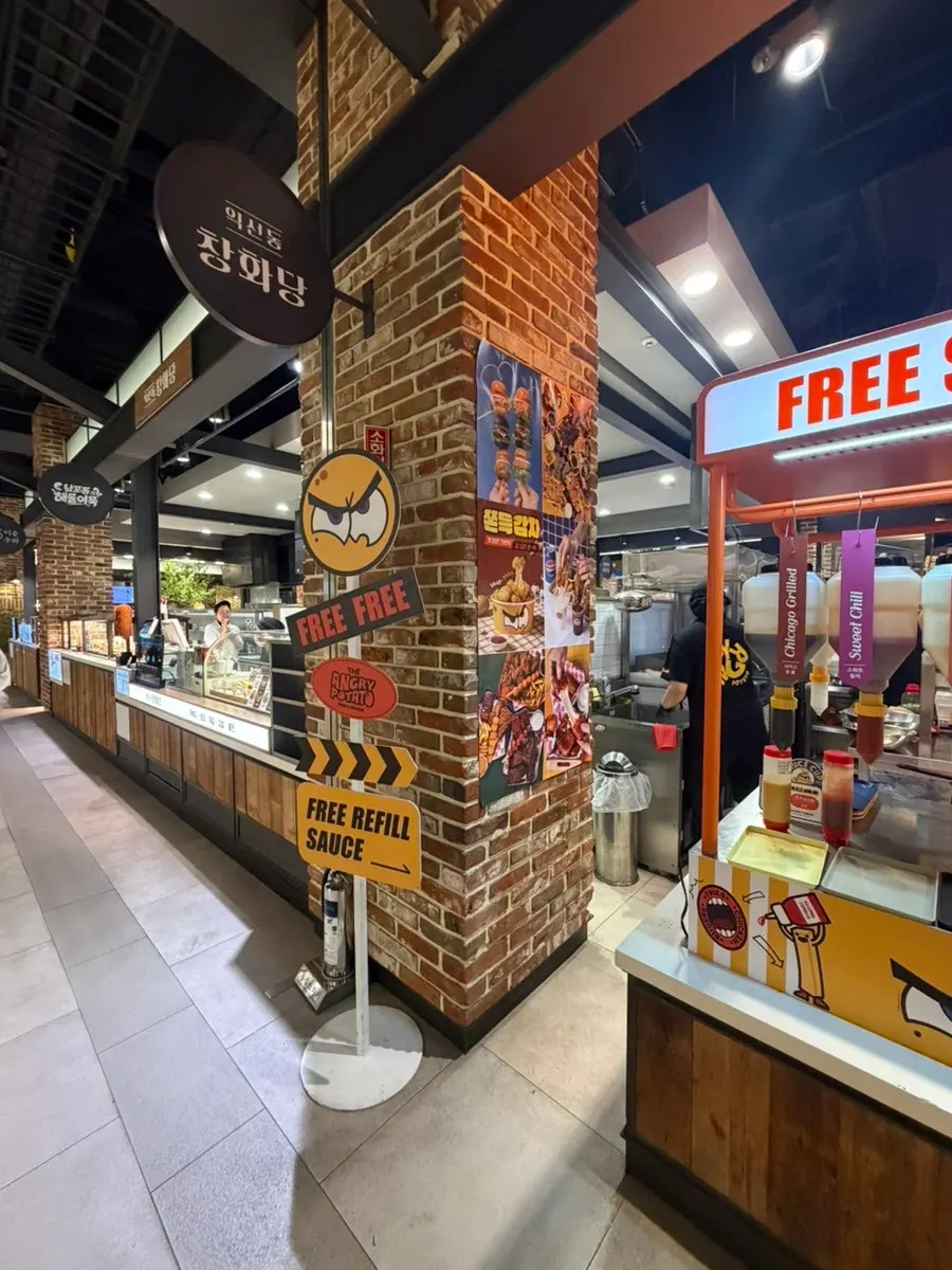 Vertical photo of the Angry Potato Songdo storefront