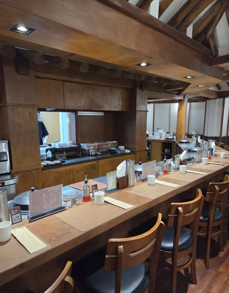 Hanok interior with visible rafters and beams