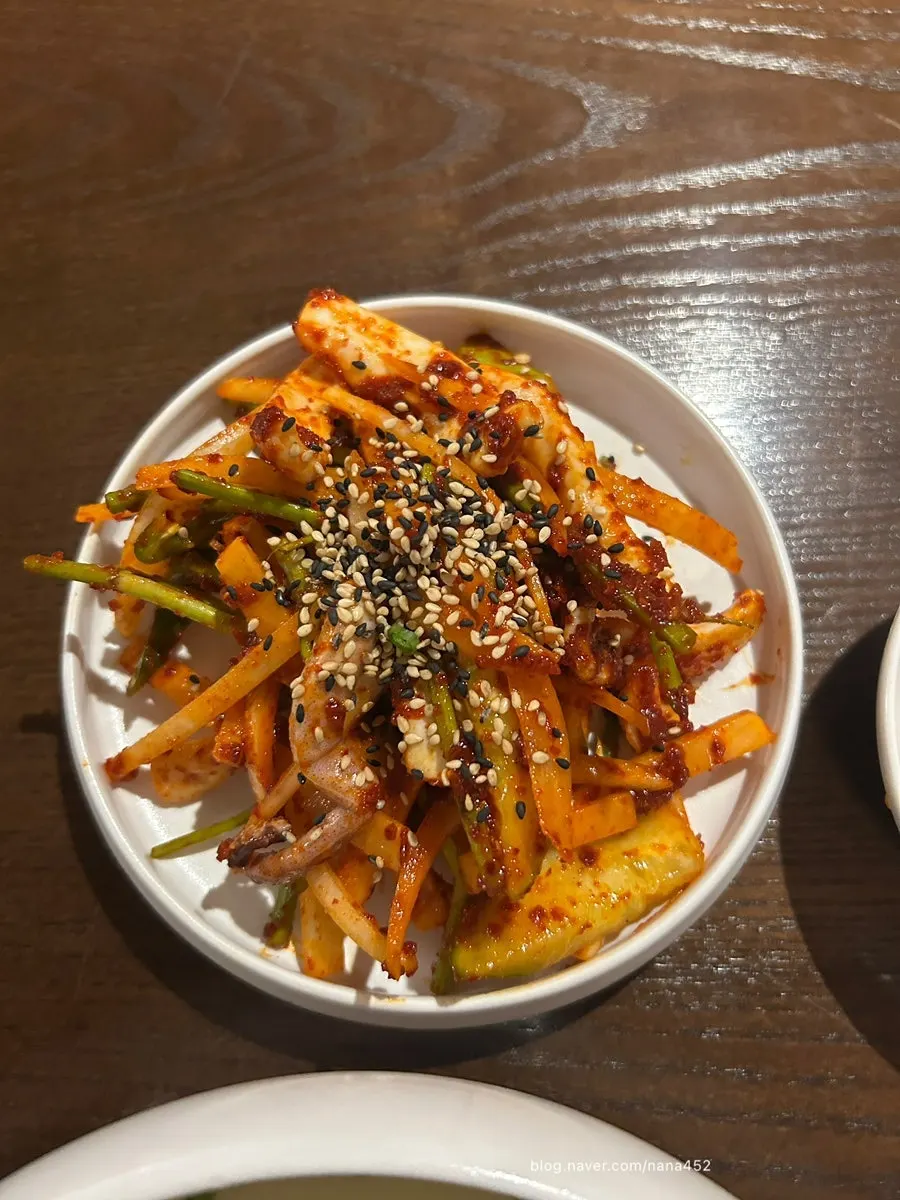 Half portion of spicy-sour squid salad