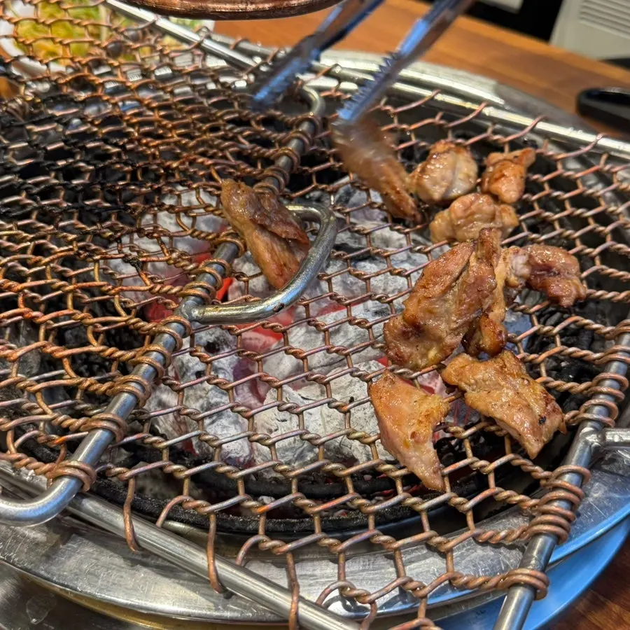 Pork ribs grilled and cut into pieces