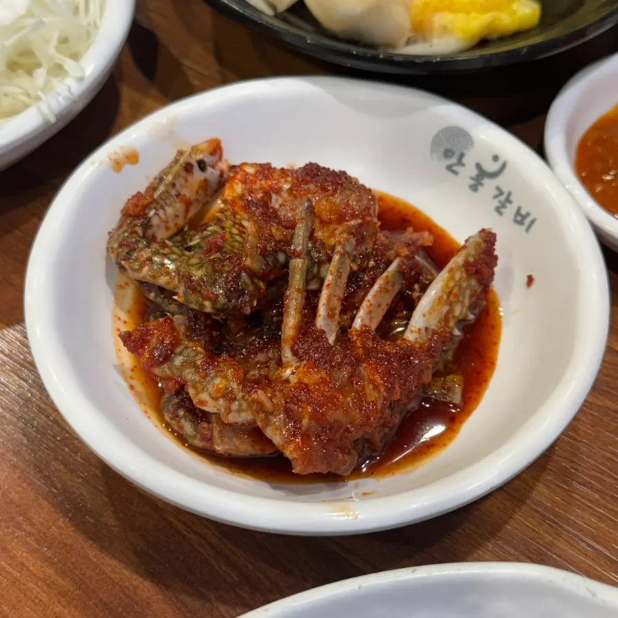Pork ribs served with cabbage wraps and radish salad