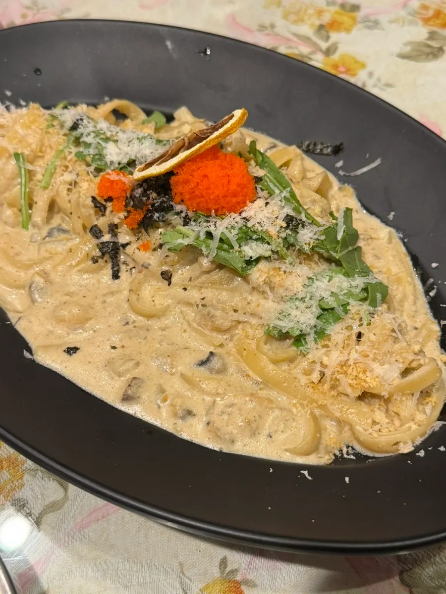 Plate of snow crab guts cream pasta