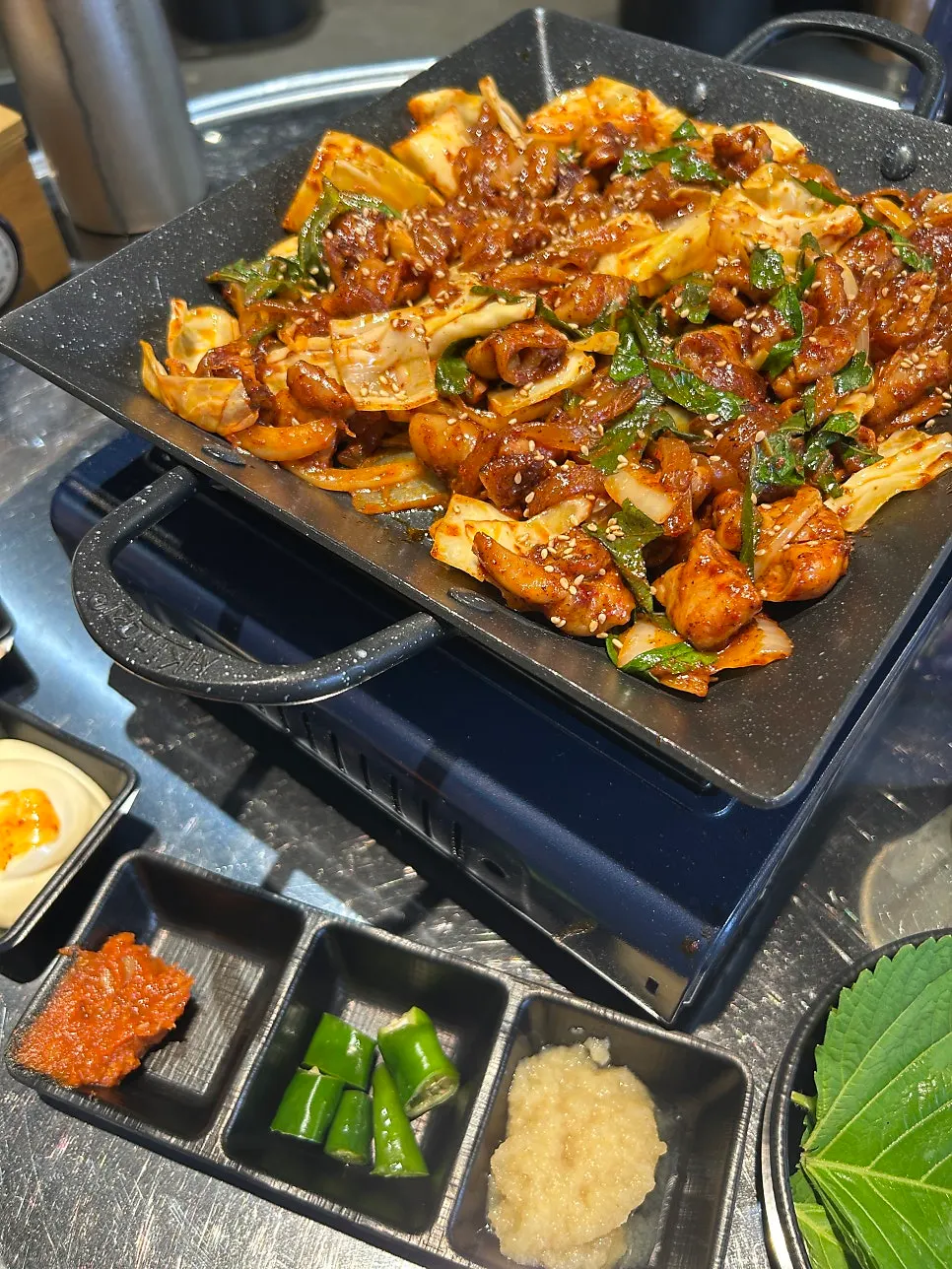 Spicy seasoned vegetable gopchang on the grill