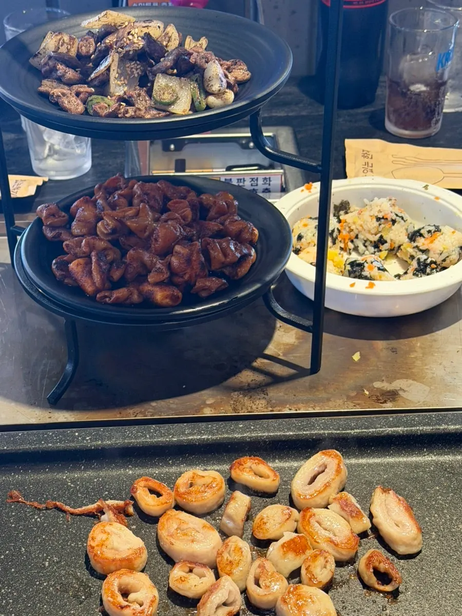 Two grills used to separate seasoned and unseasoned meat
