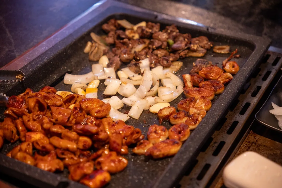 Close-up of golden-brown grilled makchang and gopchang