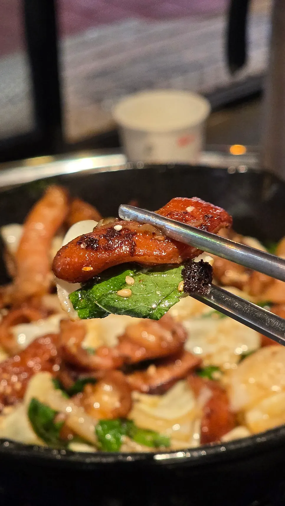 Close-up of makchang grilled together with cabbage