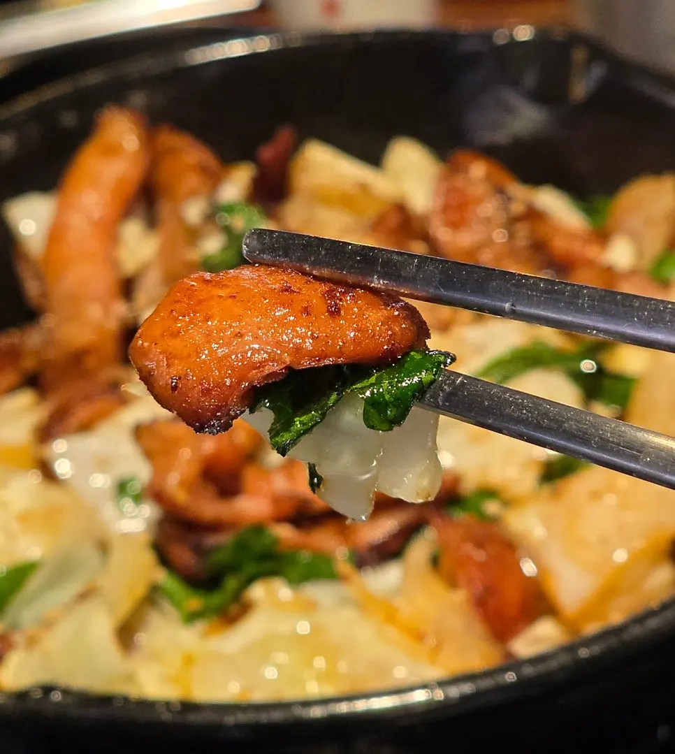 A piece of salt-grilled makchang eaten as a late-night snack at Gopchang119