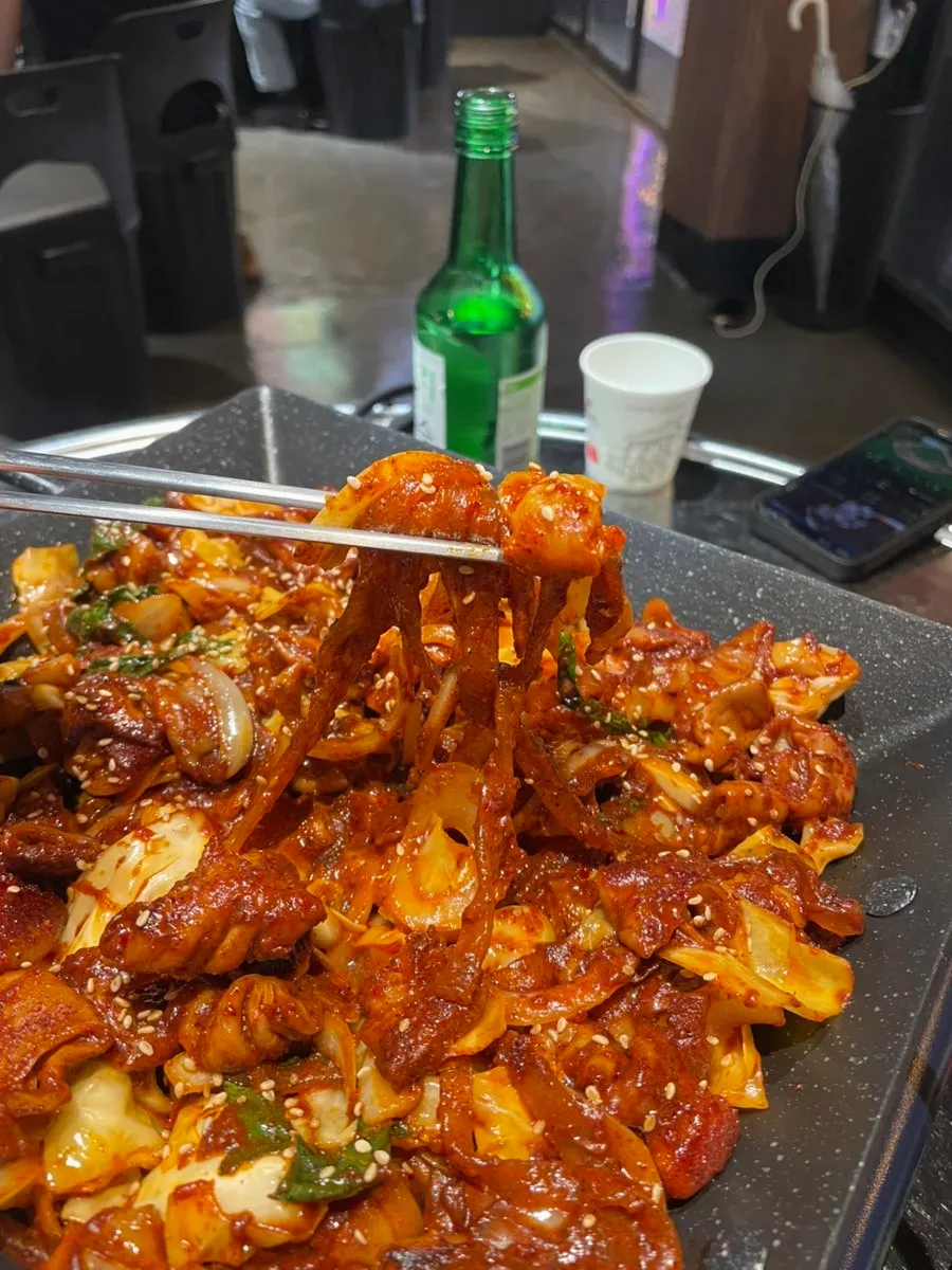 Glass noodles and gopchang soaked in sauce