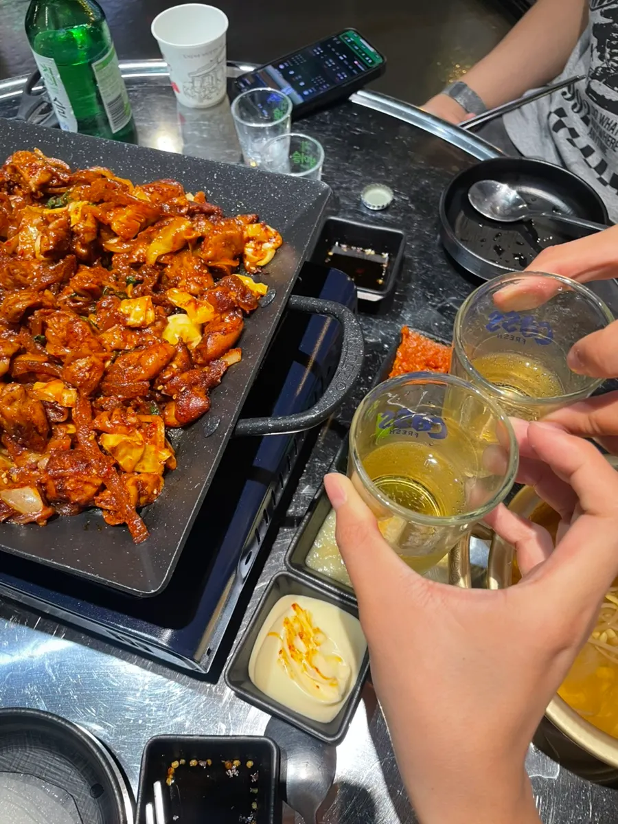 A glass of somaek enjoyed with the vegetable gopchang