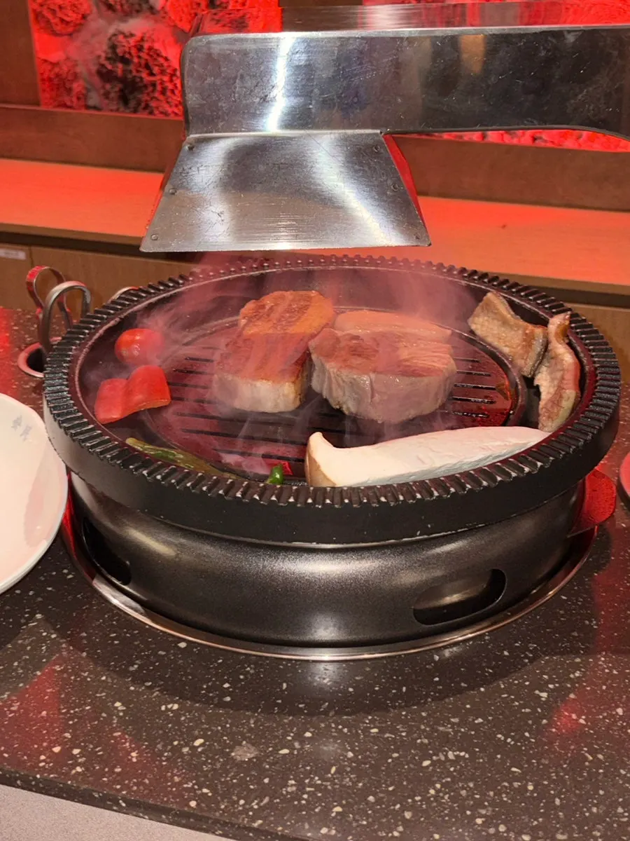 Charcoal brazier brought to the table