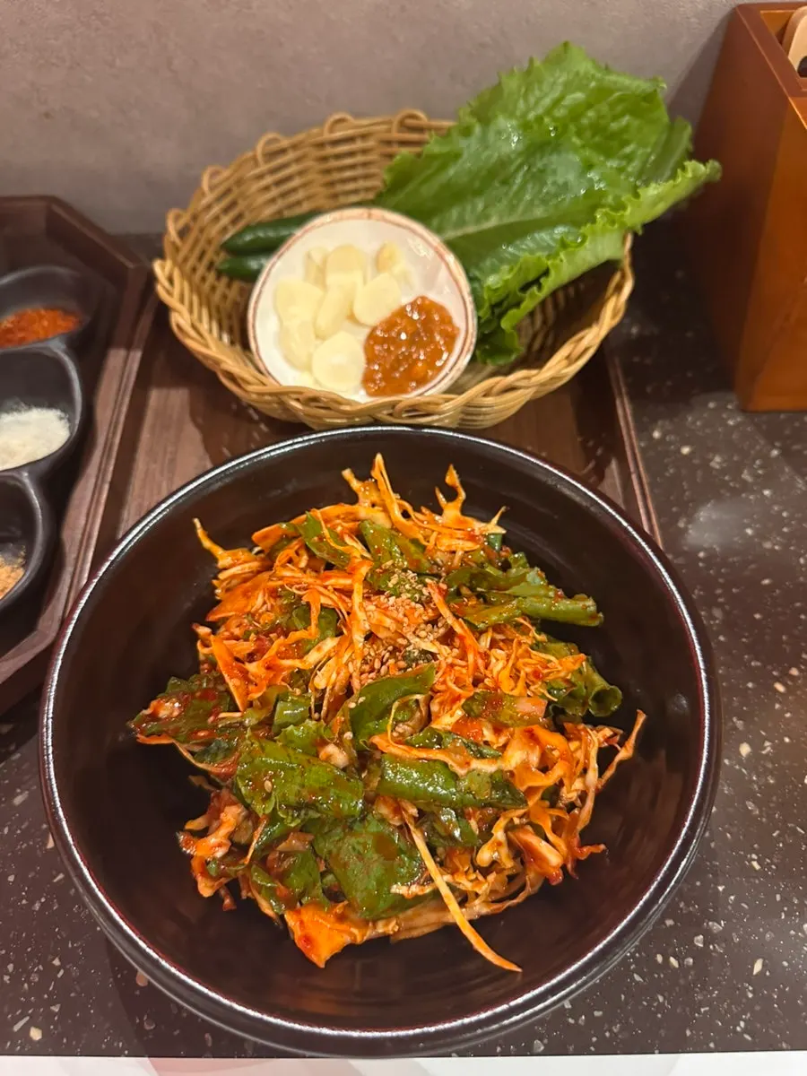 Table spread with added cabbage salad