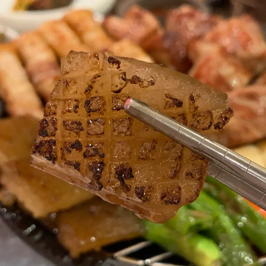 Anmin's herbal-marinated grilled pork rind