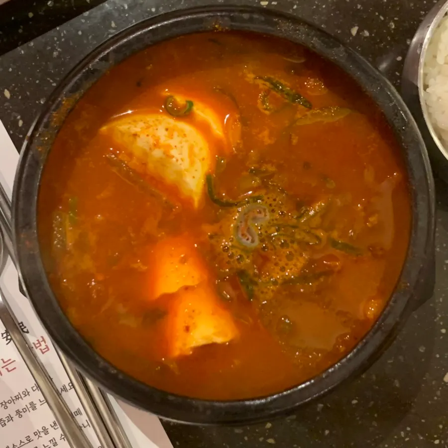 A bowl of earthenware soft tofu stew
