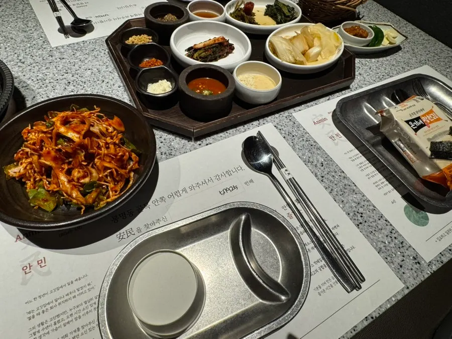 Various sauces served alongside the meat