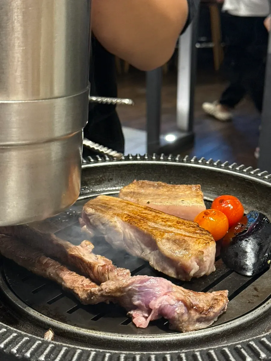A piece of pork neck dipped in salt