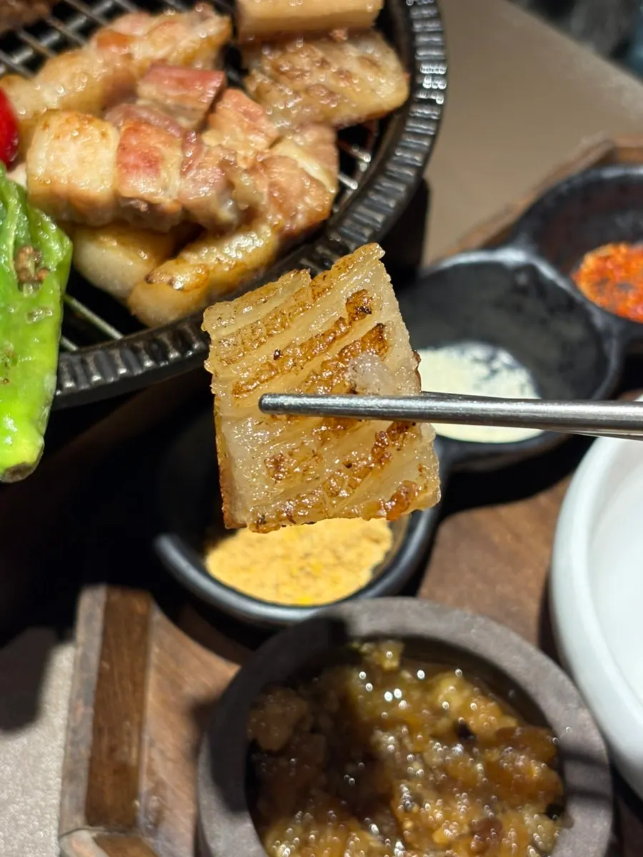 Close-up of crispy grilled pork belly