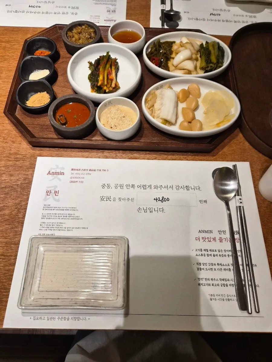 Chopsticks, side dishes, and sauce plates set at the reserved table