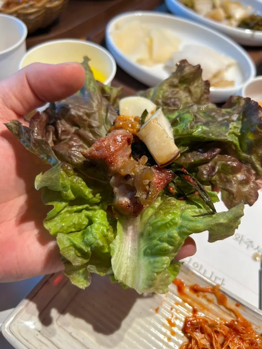 Dipping meat into sauce