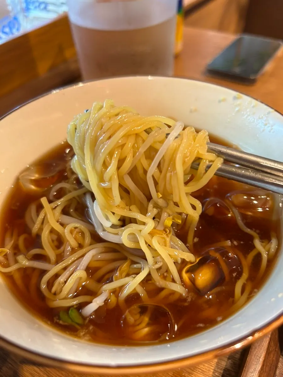 Cold ramen topped with grated radish and wasabi
