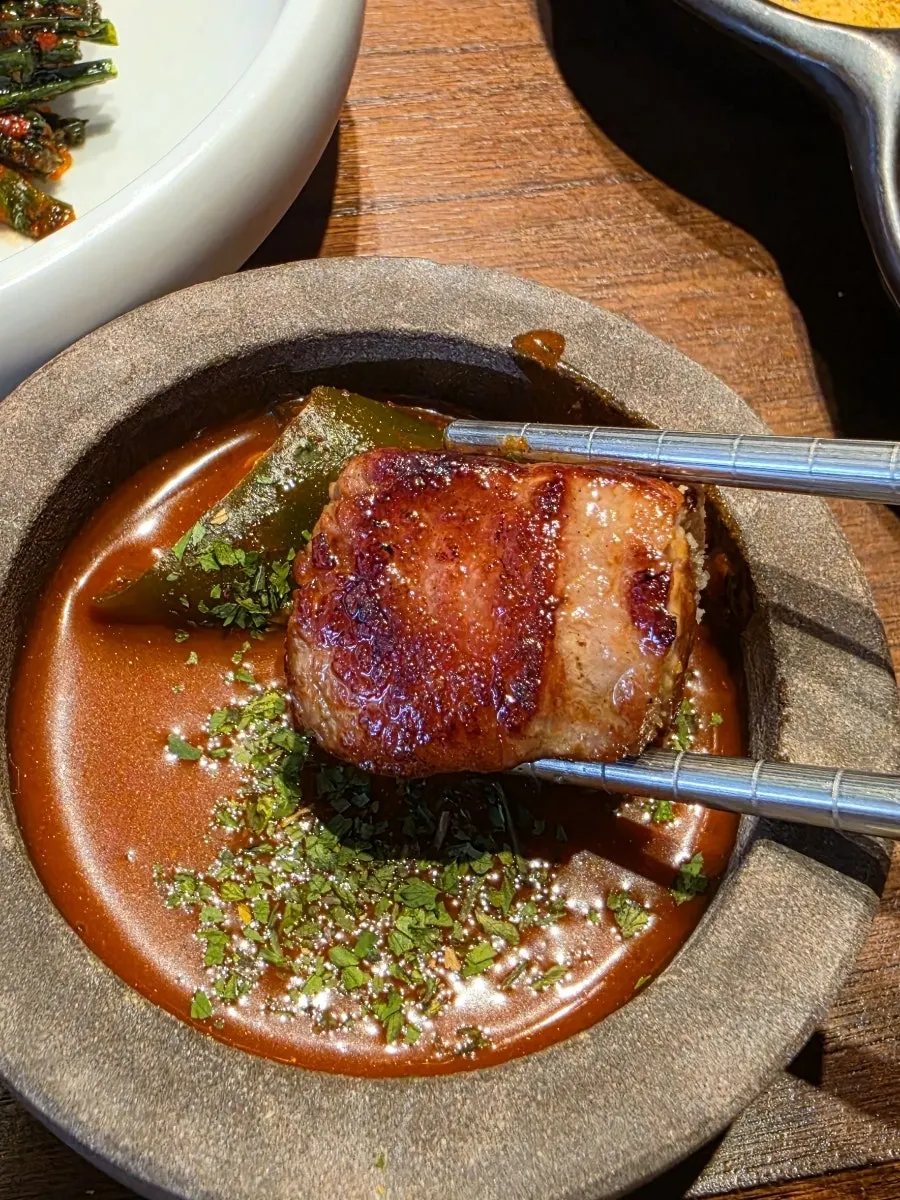 A juicy piece of grilled pork neck