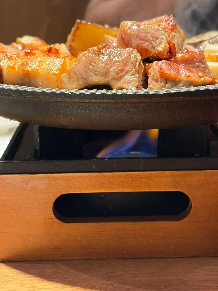 Pork belly and pork neck turning golden brown