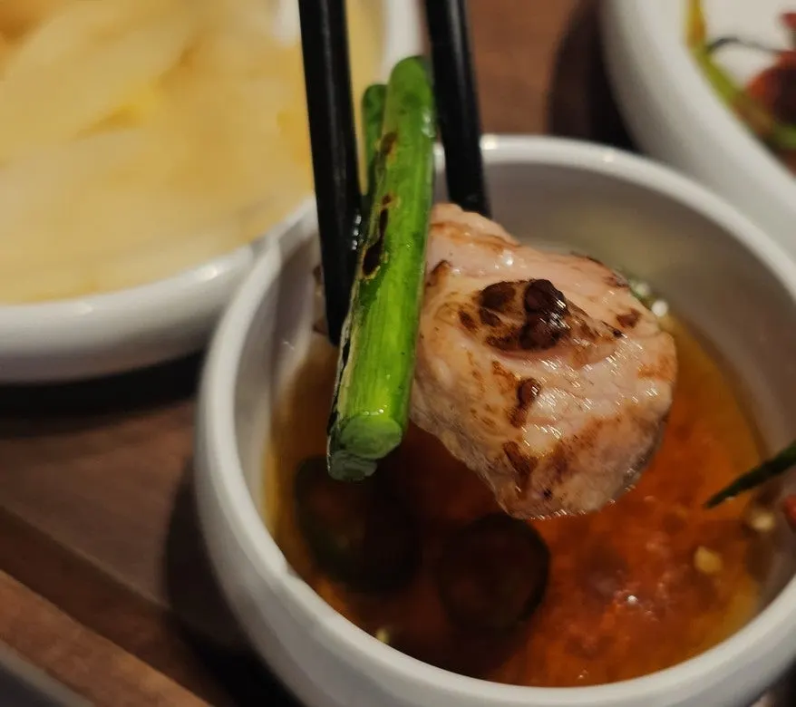 Pork neck spread served with various sauces
