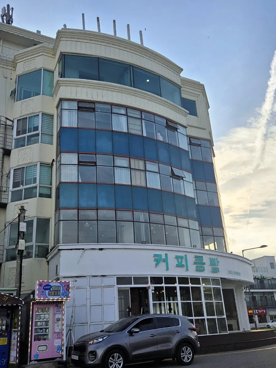 Exterior of Your Anmok pension building in front of Anmok Beach