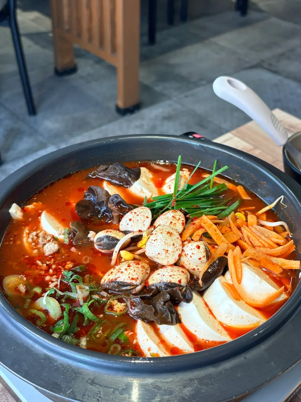 Clam sundubu hot pot made with the spicy broth