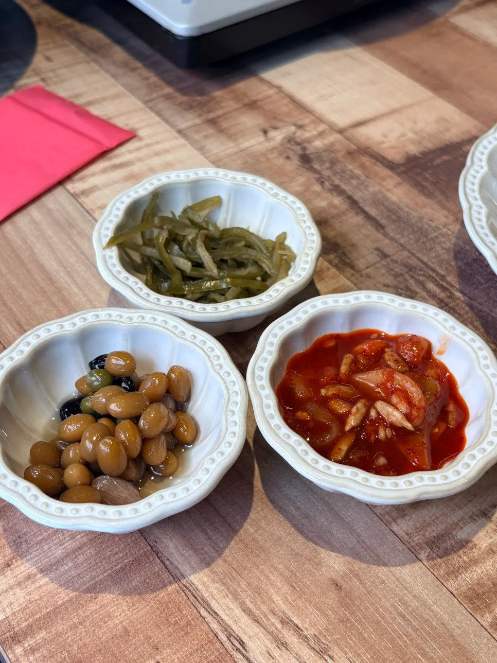The full spread of side dishes we ate through