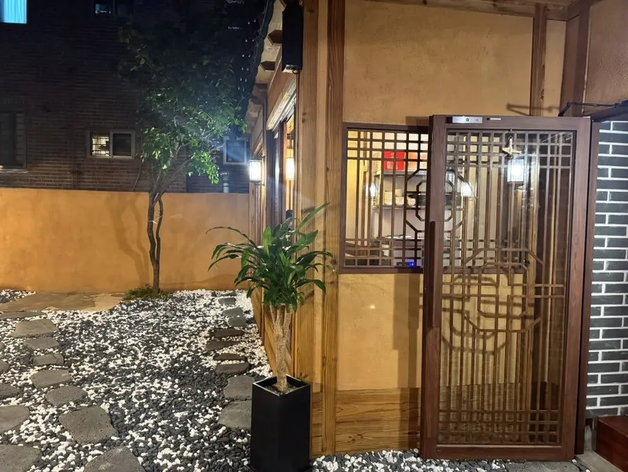 Anok's hanok-style interior decorated in wood tones