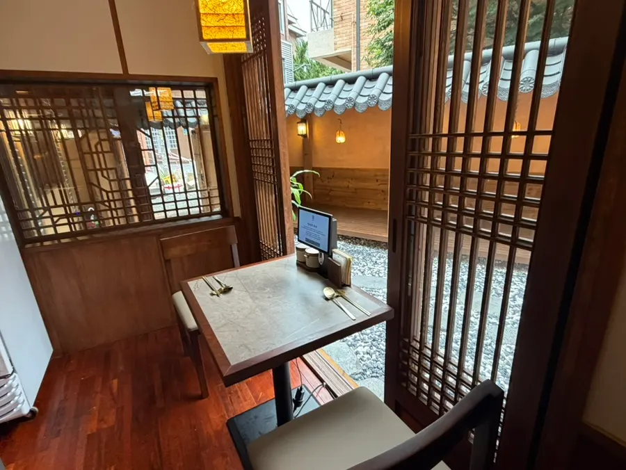 Anok's hanok-feel two-top seating