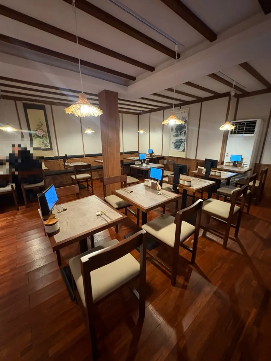 Tables pushed together for Anok's group seating
