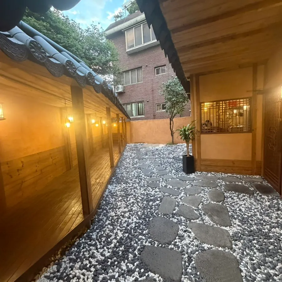 Anok's courtyard with lighting and trees