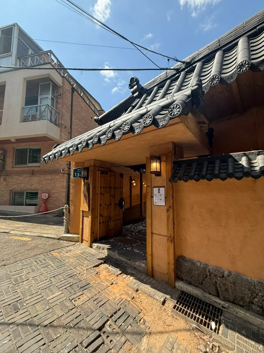 Anok's hanok exterior seen from the Hongik-ro alley