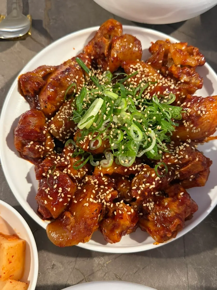 A plate of spicy-seasoned pork tail jjim