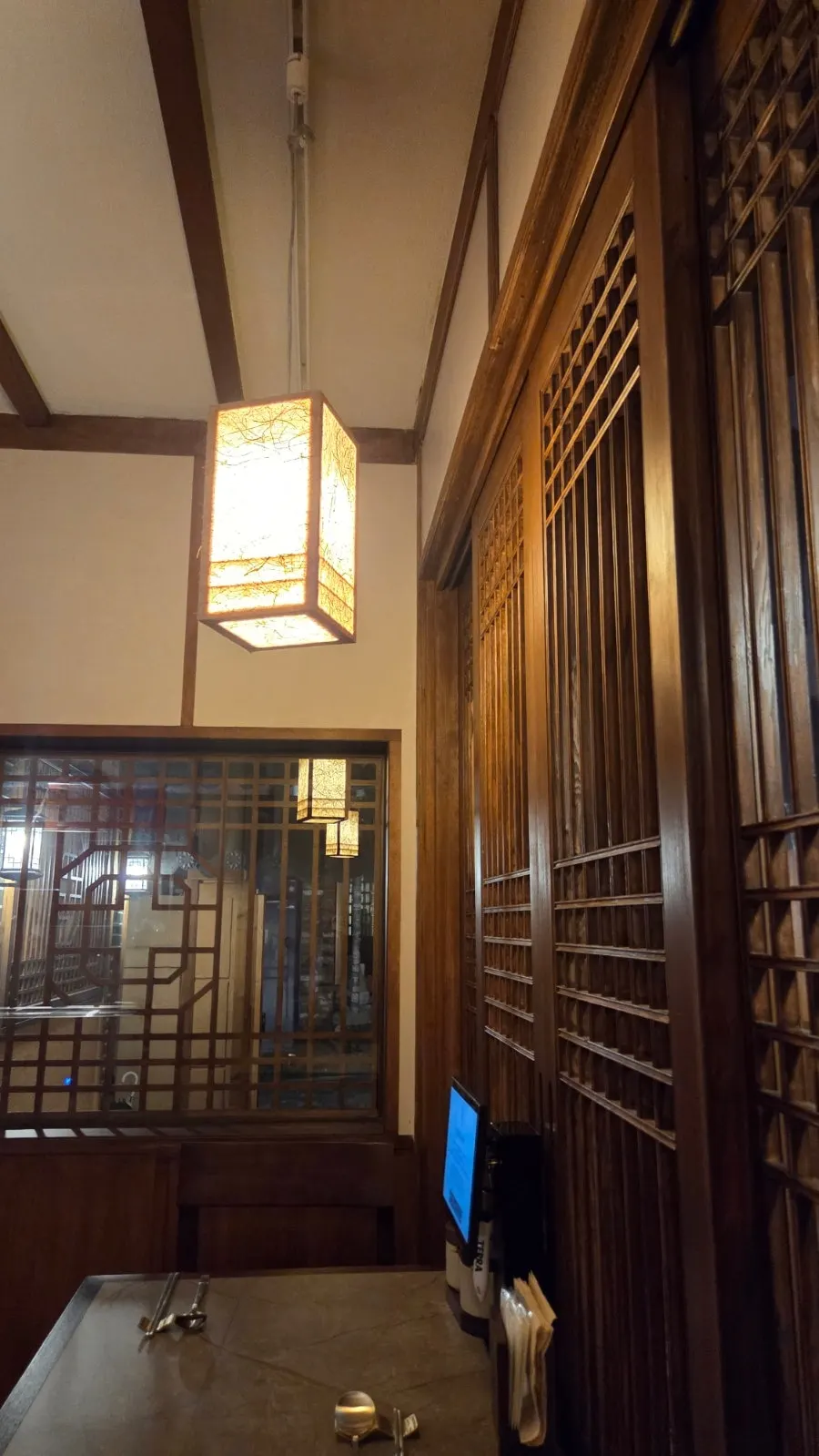 Interior of Anok with sliding doors and hanji lighting