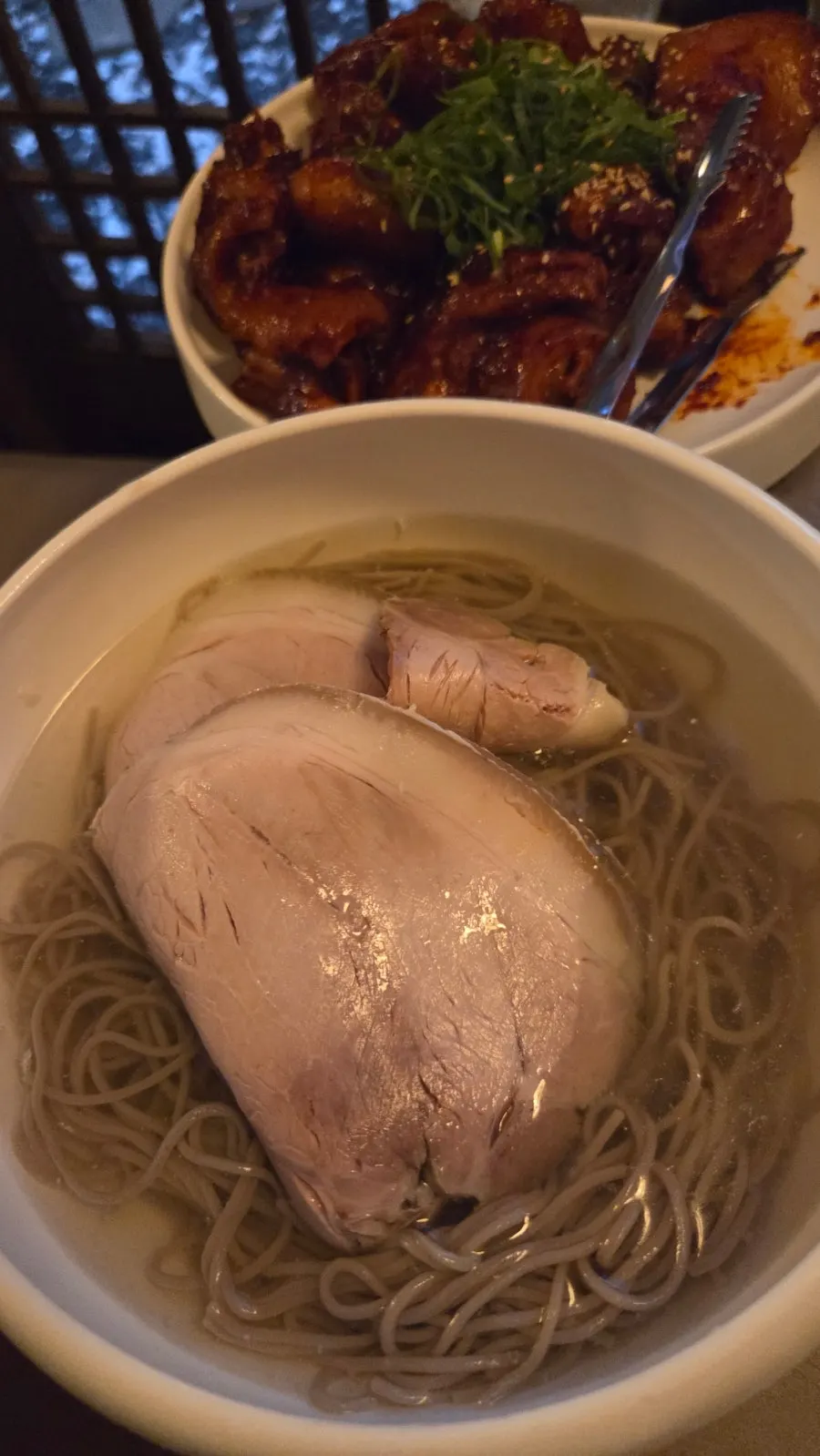 Table set with ordered gomtang and naengmyeon