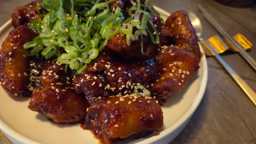 Visually striking steamed pork tail at Anok