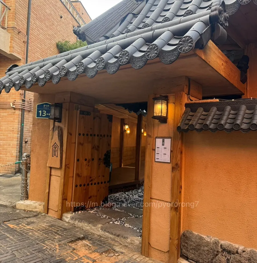 Vertical photo of Anok's hanok-style building