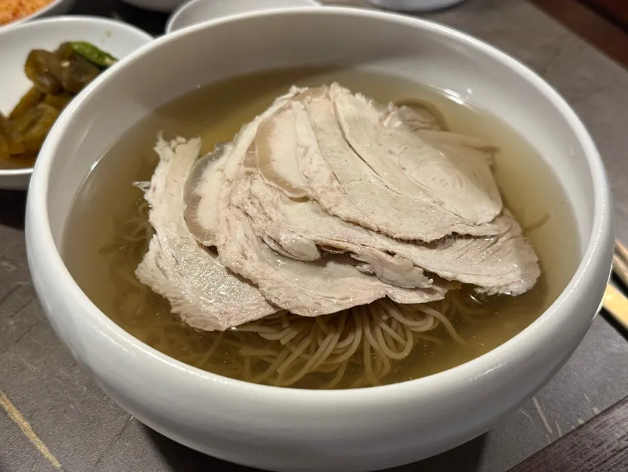 A bowl of Anok's Pyongyang naengmyeon in water broth