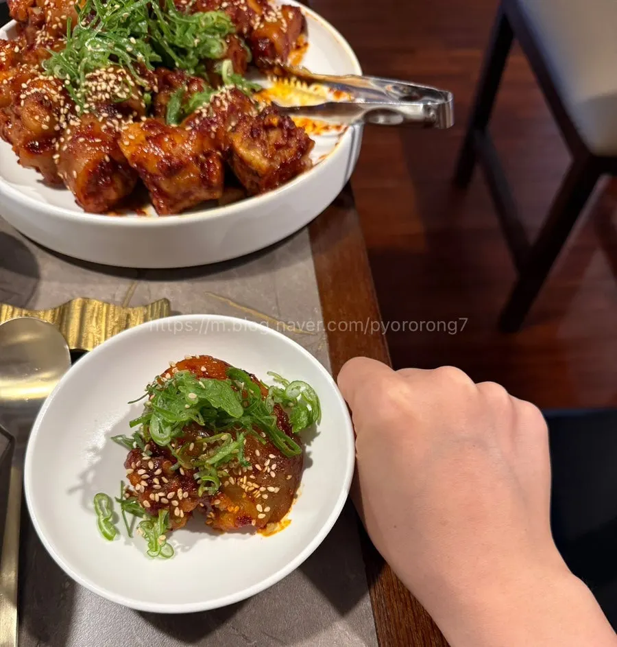 A piece of pork tail compared in size to a fist