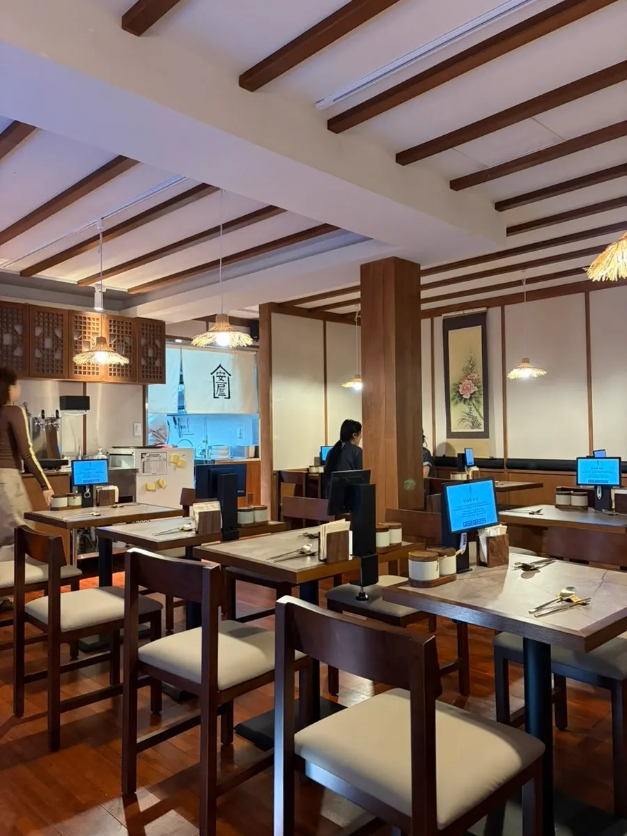 Anok's interior and a two-person table