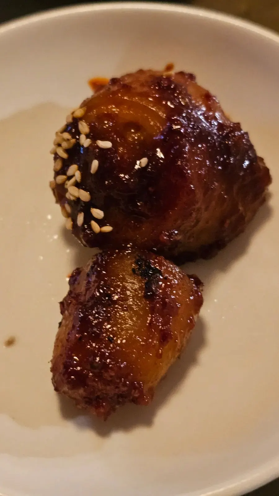 Pork tail jjim plated on a small dish