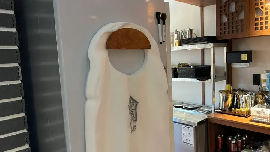 Disposable aprons available in the restaurant