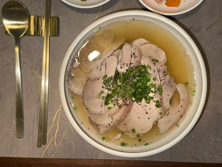 A neatly arranged full-course table at Anok