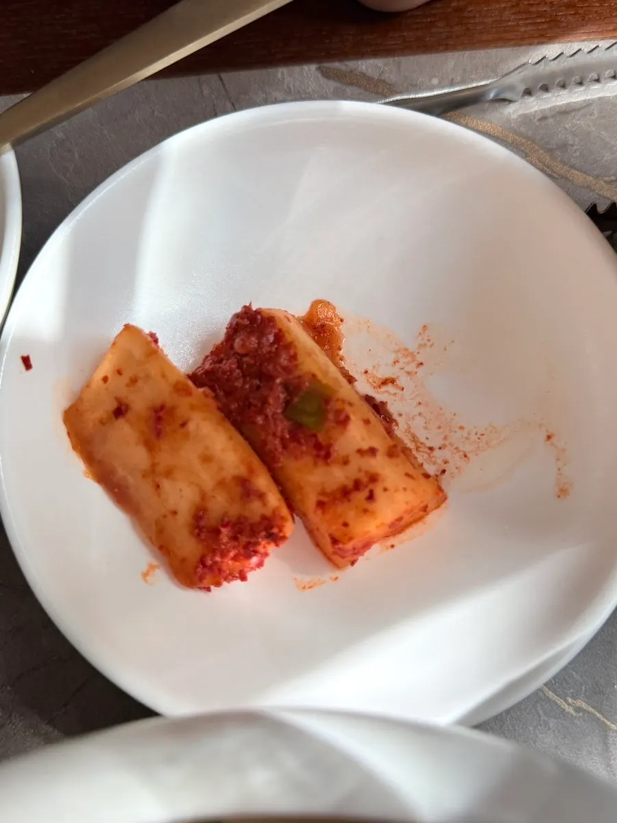 Plate of pickled side dishes at Anok