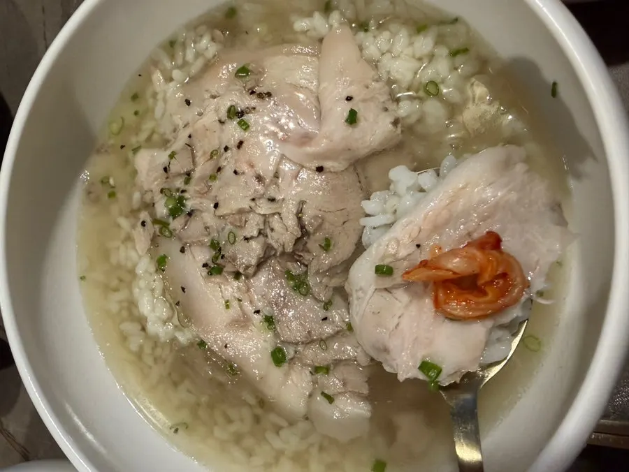 Clear pork gomtang served with rice already mixed in