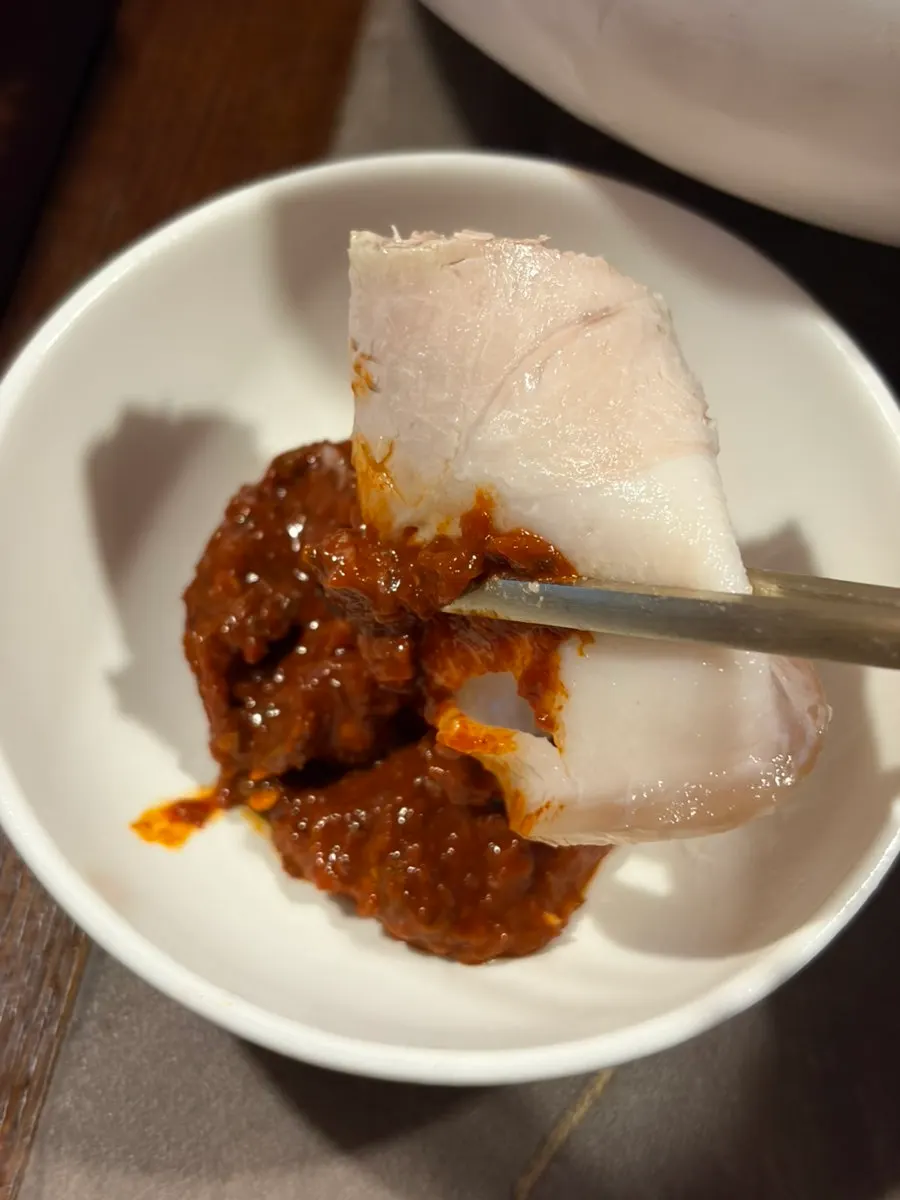 Close-up of the generous meat inside the clear pork gomtang